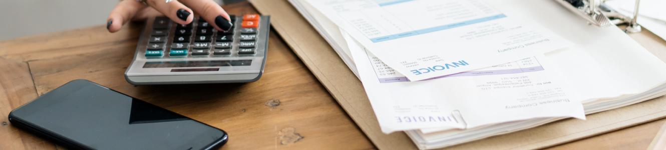 woman using calculator